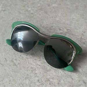PRADA green futuristic sunglasses